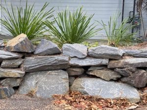 Stone walls are the easiest to build among the retaining wall diy jobs.